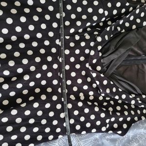 Large polka dot swing dress.